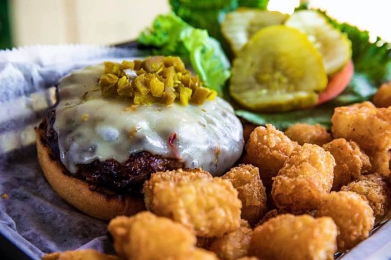 The jalapeño burger with a side of Tiki Tots